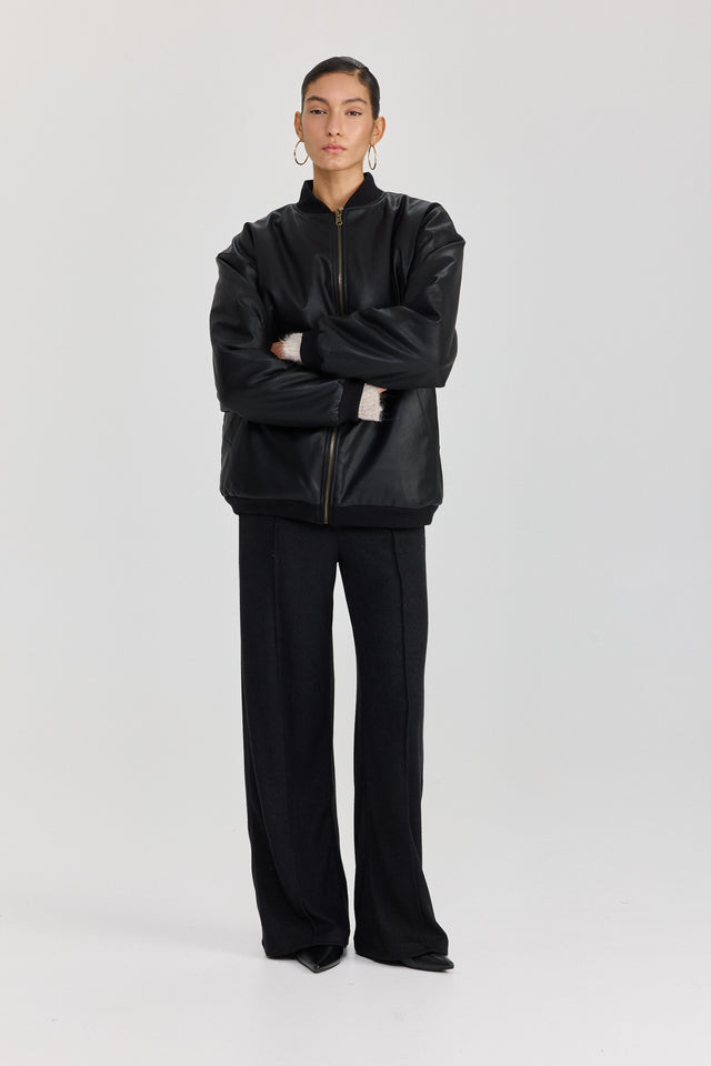 מעיל פנטאסי דו צדדי דמוי עור ופרווה שחור