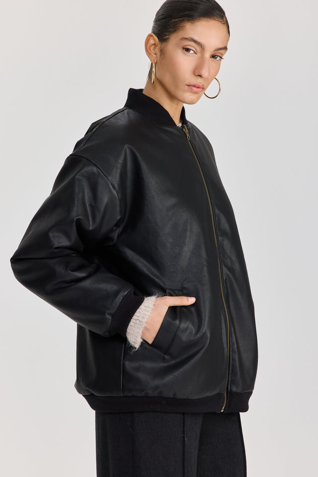 מעיל פנטאסי דו צדדי דמוי עור ופרווה שחור