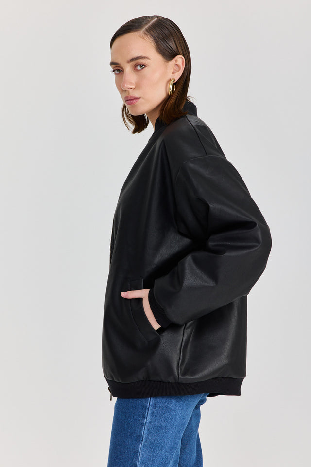 מעיל פנטאסי דו צדדי דמוי עור ופרווה שחור