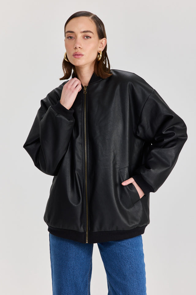 מעיל פנטאסי דו צדדי דמוי עור ופרווה שחור