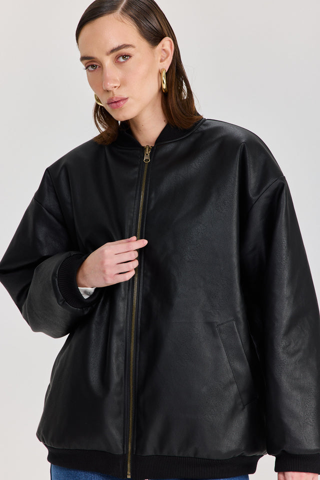 מעיל פנטאסי דו צדדי דמוי עור ופרווה שחור