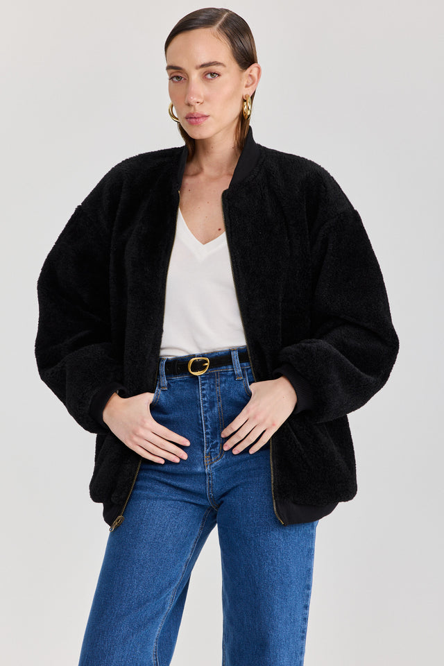 מעיל פנטאסי דו צדדי דמוי עור ופרווה שחור