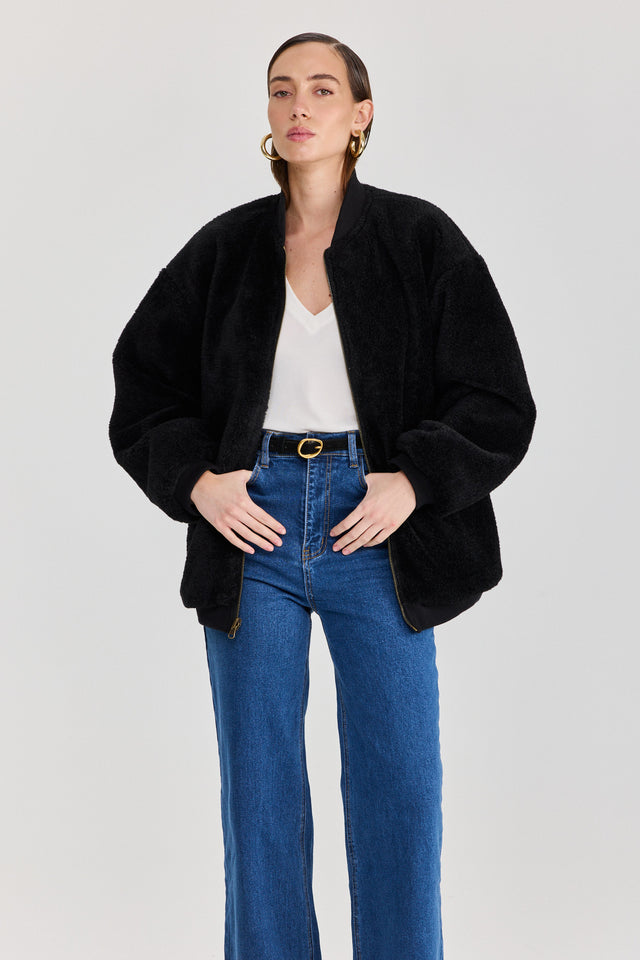 מעיל פנטאסי דו צדדי דמוי עור ופרווה שחור