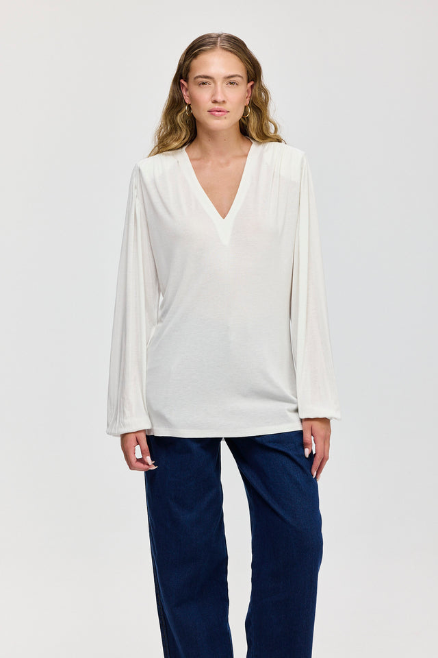 חולצה מפתח וי כיווצים ברוסקטה שרוולים תפוחים שמנת