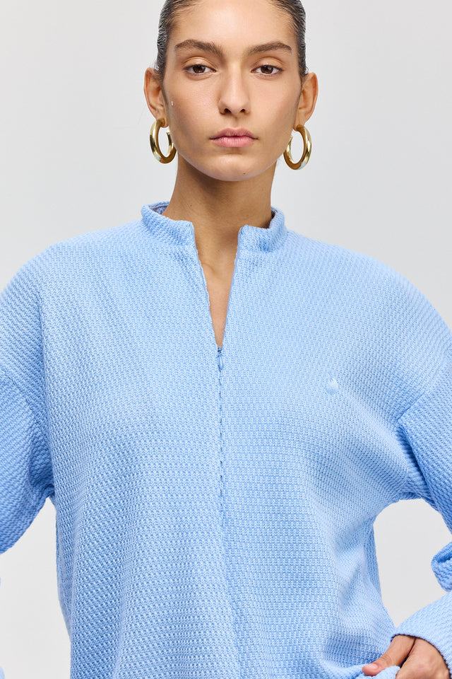 חולצת זיפר סריג ספייסי שרוולים ארוכים תכלת