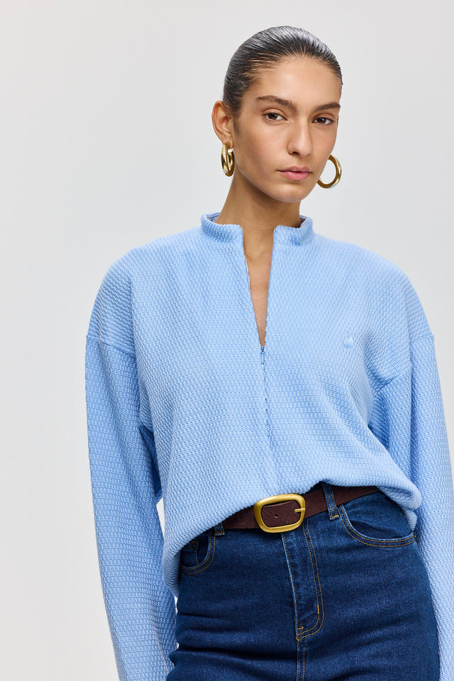 חולצת זיפר סריג ספייסי שרוולים ארוכים תכלת